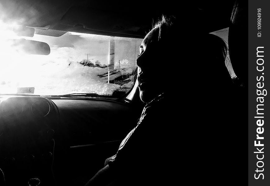 Woman Inside Car Grayscale Photo