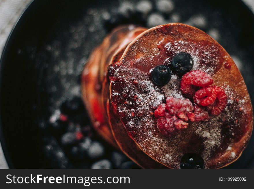 Selective Focus Photography of Raspberry and Blueberry Pancakes