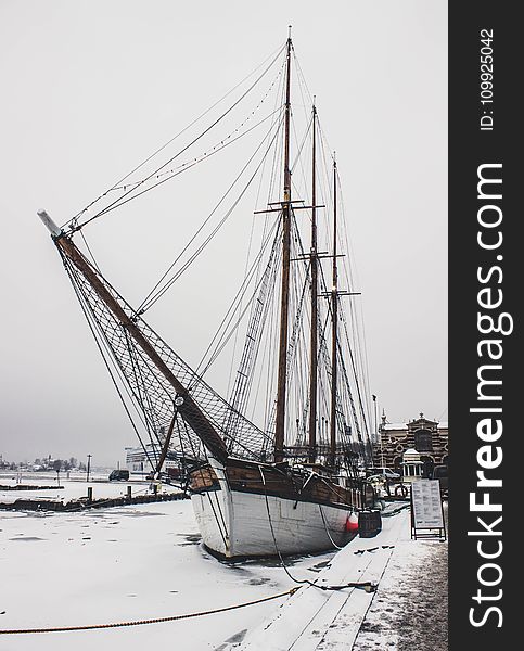 White and Brown Wooden Ship