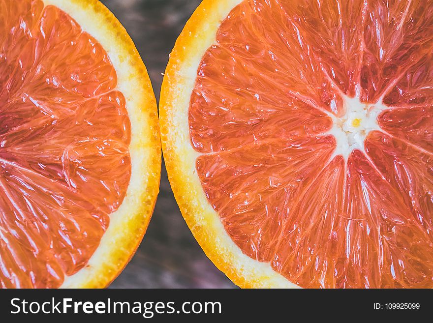 Two Sliced Citrus Fruits