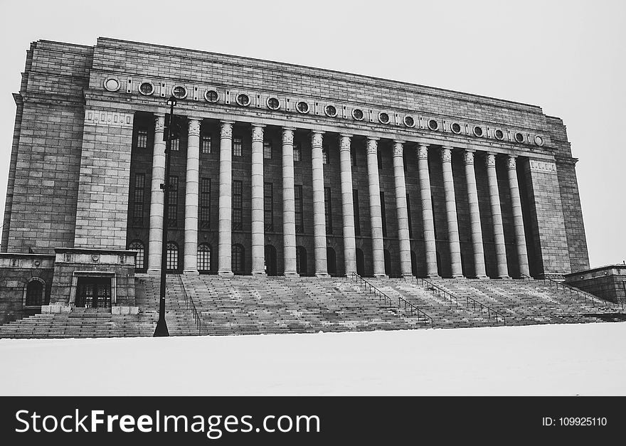 Greyscale Photo Of Concrete Building