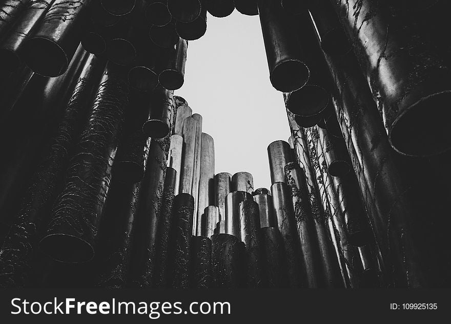 Grayscale Photography Of Chimes