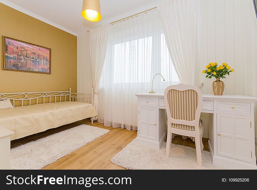 White Wooden Pedestal Desk With Beige Pleated Chair