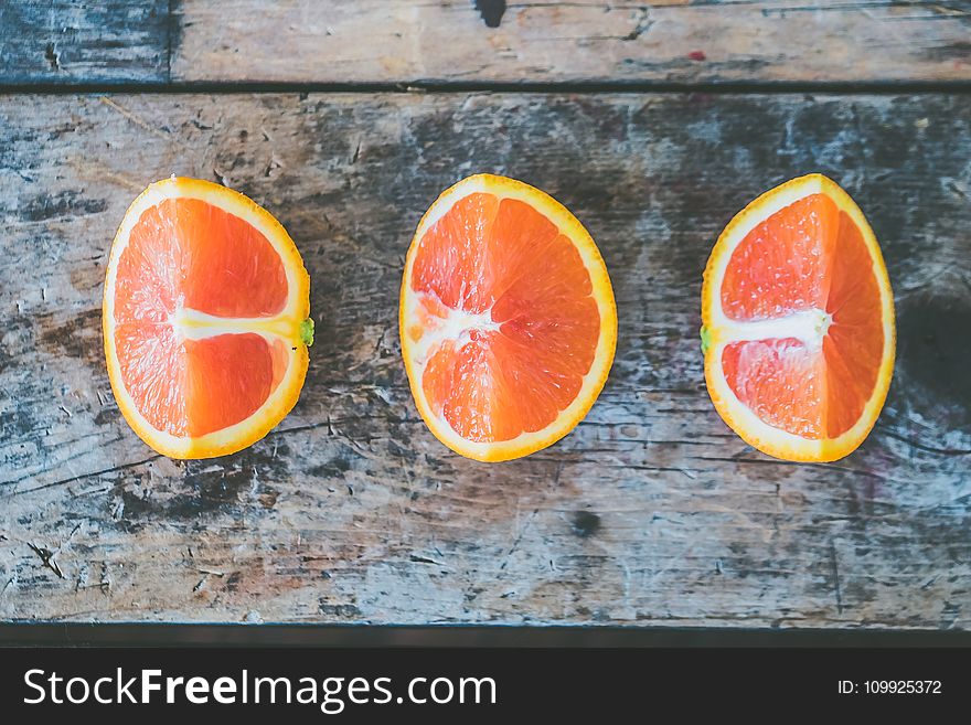 Three Slice Of Citrus Fruits