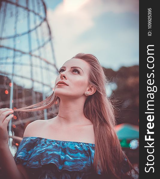 Woman In Blue Off-shoulder Printed Dress