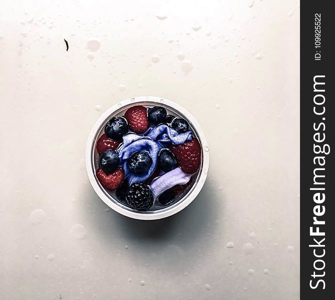 Flat Lay Photo of Berries in Container