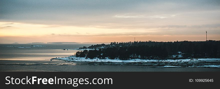 Panoramic Photo Of Island During Golden Hour