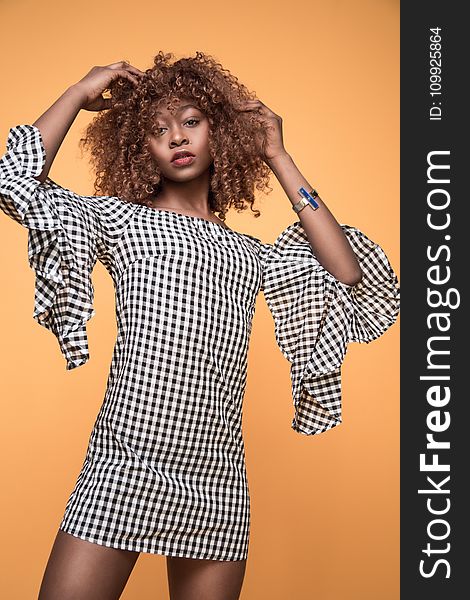 Woman Wearing White and Black Checkered 3/4 Sleeved Shirt