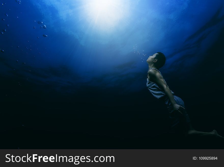 Painting Of A Person Swimming Underwater