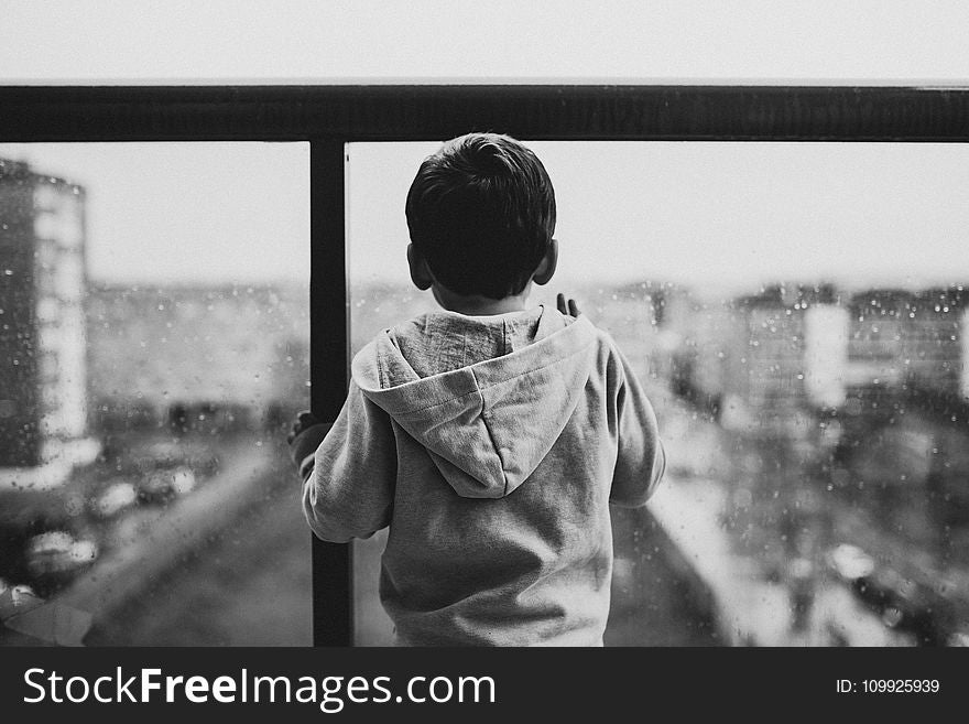 Boy Wearing Gray Hoodie