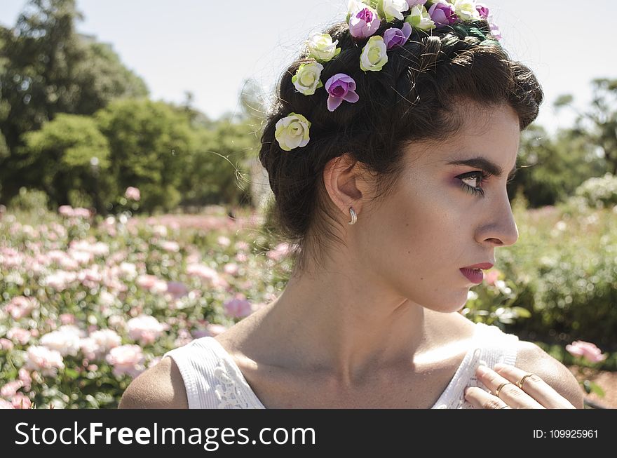 Close Up Photo Of Woman With Floral Headband