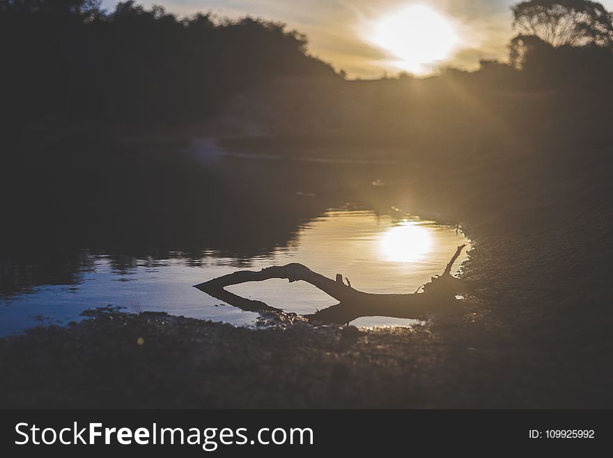 Photography of Body of Water during Sunset