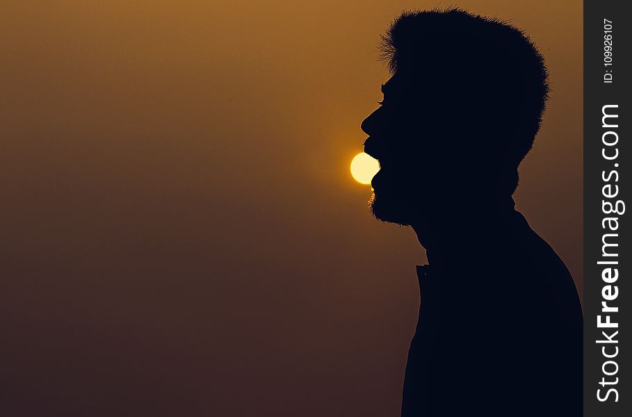 Silhouette of Man over the Horizon