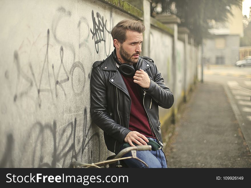 Man Wearing Black Full-zip Biker Jacket