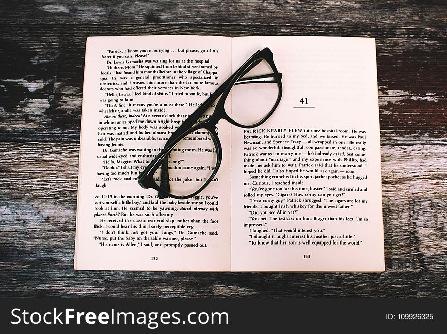 Photography Of Eyeglasses On Top Of Book