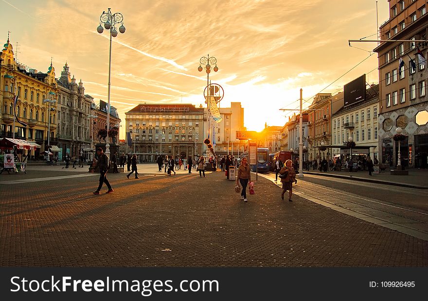 People On The Street During Sunset