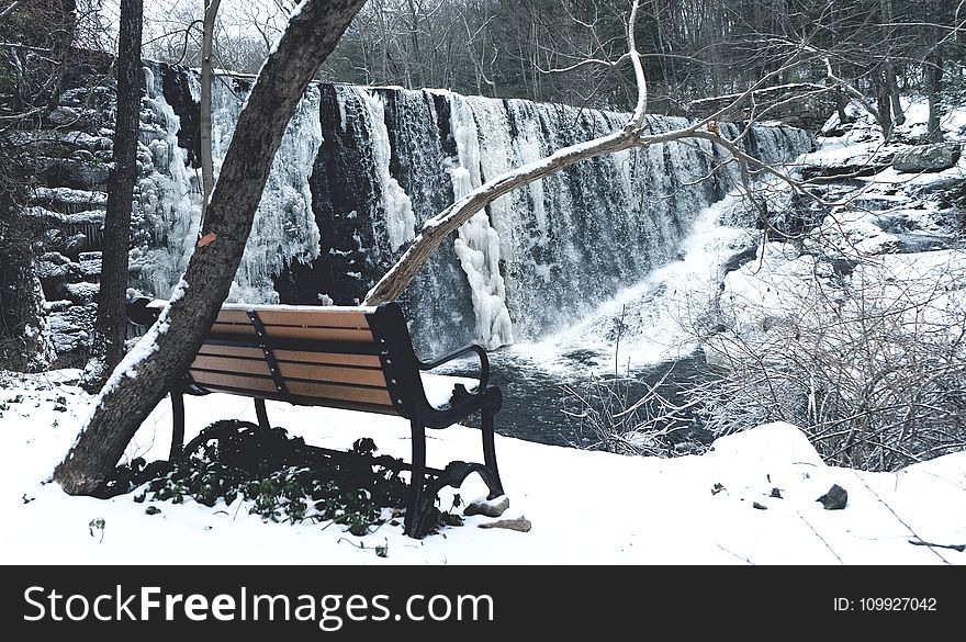 Snow Covered With Brown and Black Steel Couch