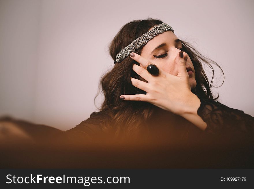 Woman Wearing Gray Woven Headband