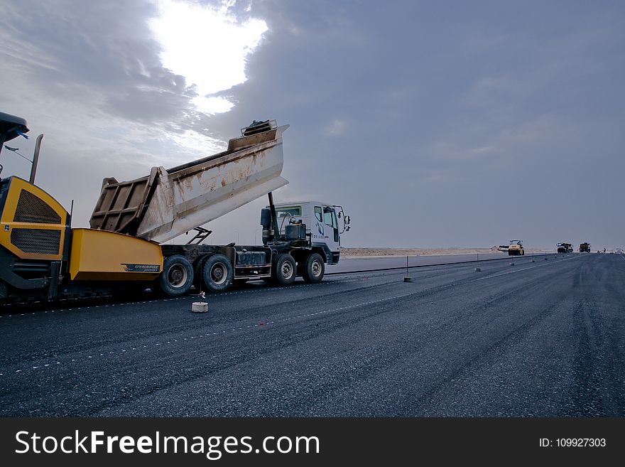 White and Brown Dump Truck