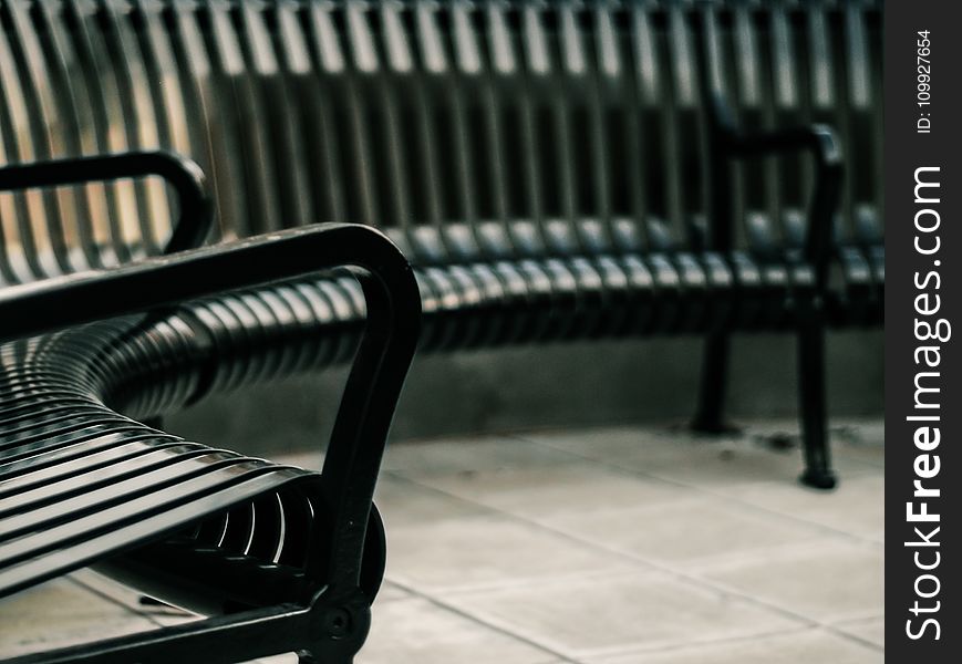 Photo Of Black Steel Armchair And Bench