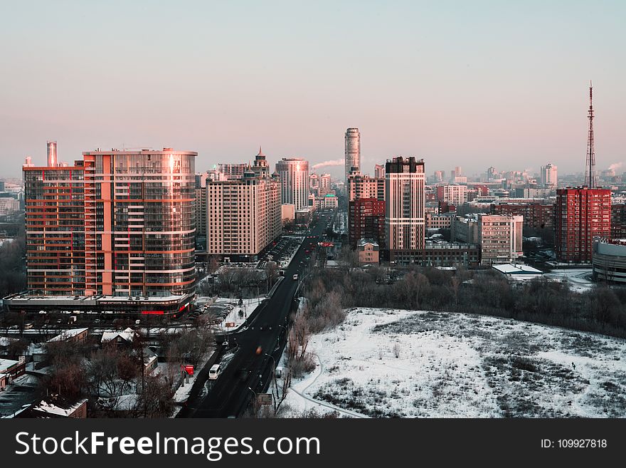 White and Red High-rise Building during Winter Season