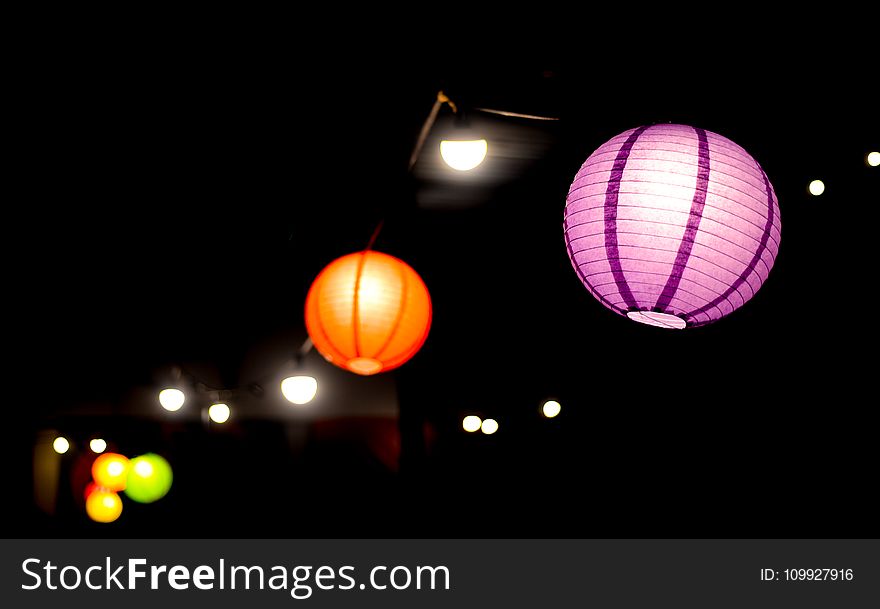 Two Purple And Orange Lanterns Photo