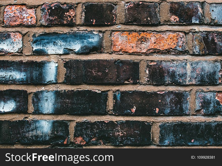 Black, Blue, and Orange Concrete Brick