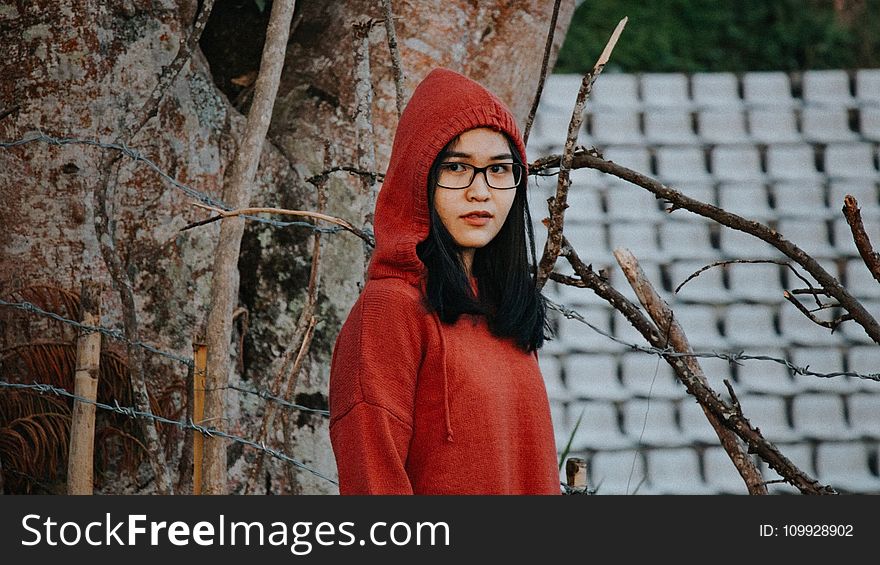 Woman In Red Pullover Hooded Jacket