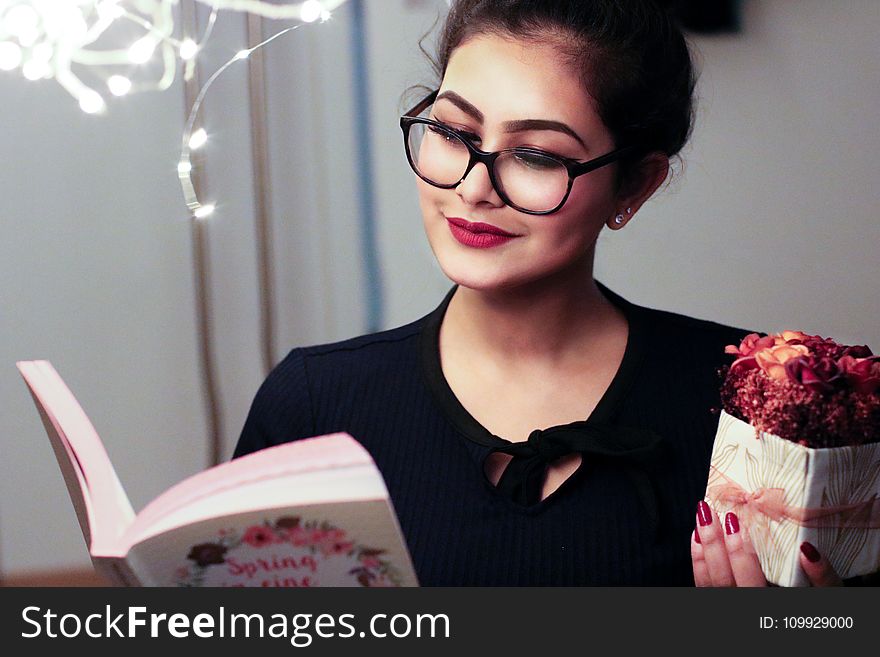 Woman Holding Book