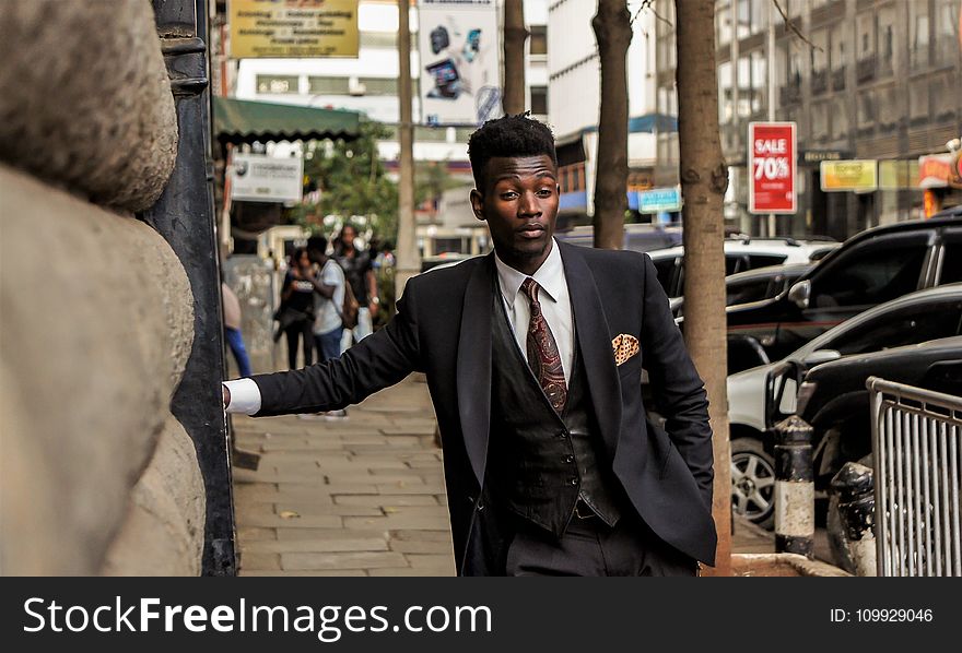 Man Wearing Black Shawl Lapel Suit Jacket