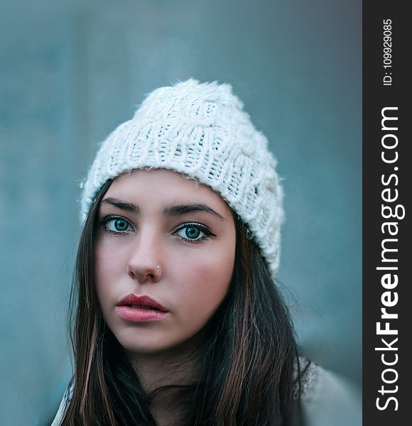 Woman Wearing Knitted White Hat With Nose Ring