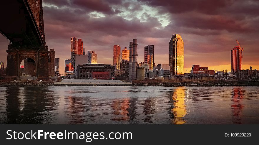 Panoramic Photography of City Near Body of Water