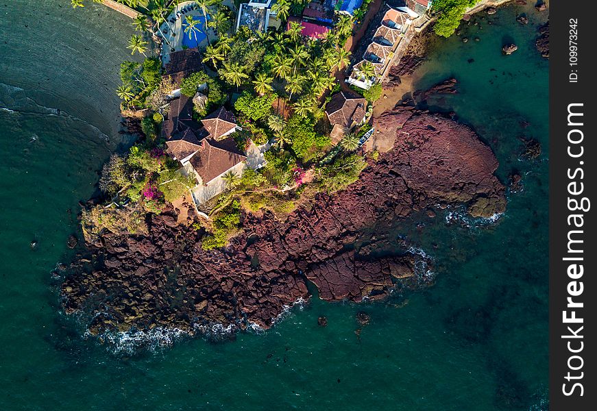 Bird&#x27;s-eye View of House Near Body of Water