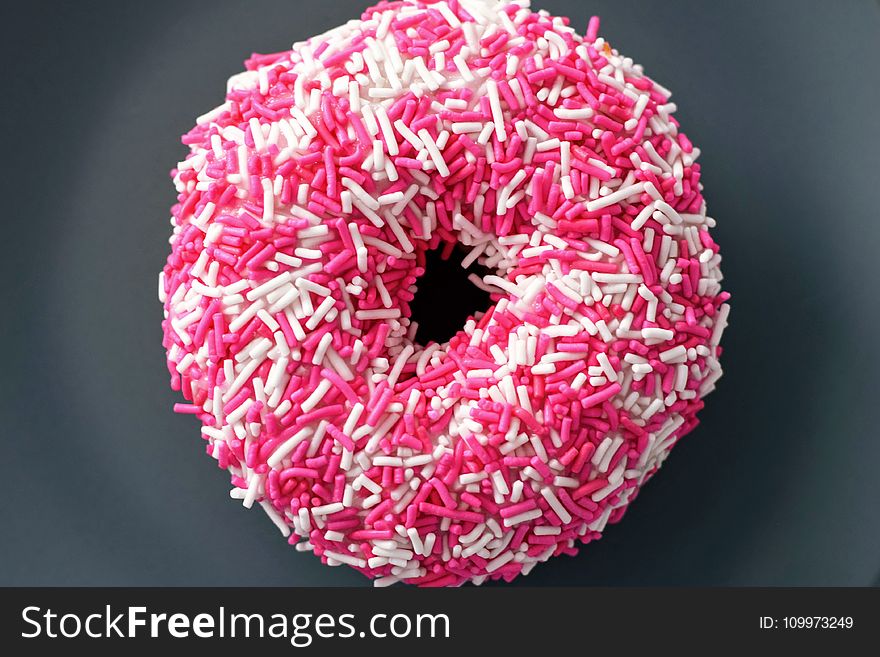 Doughnut With White and Pink Sprinkles