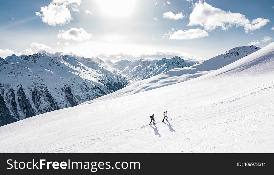 Two Man Hiking on Snow Mountain