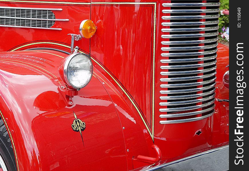 Antique fire engine displayed at a town fair