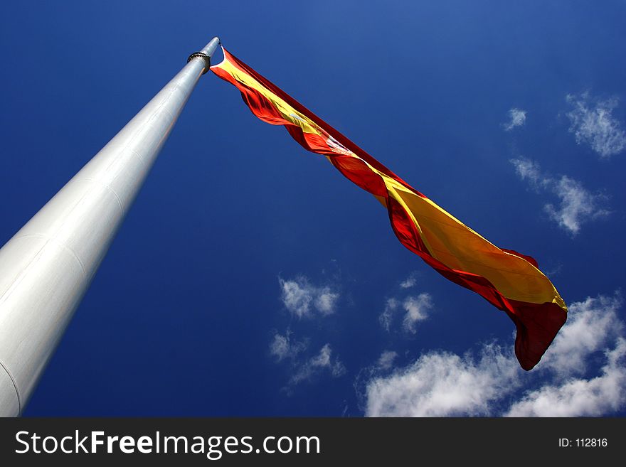 Spanish flag blowing in the wind. Spanish flag blowing in the wind