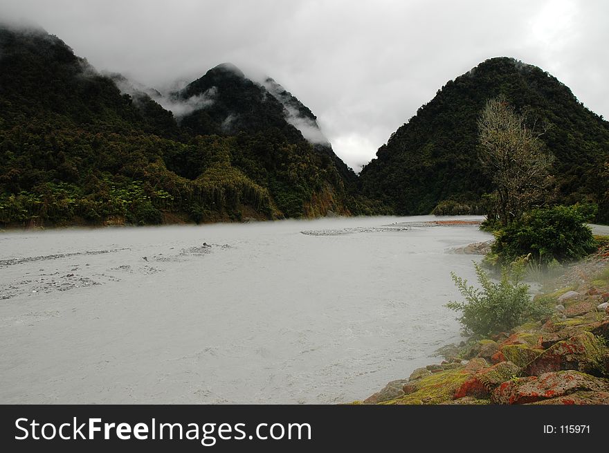 This river is fed by the Franz Joseph Glacier in New Zealand... This is what happens when the area gets some of it's 7m annual rainfall!. This river is fed by the Franz Joseph Glacier in New Zealand... This is what happens when the area gets some of it's 7m annual rainfall!