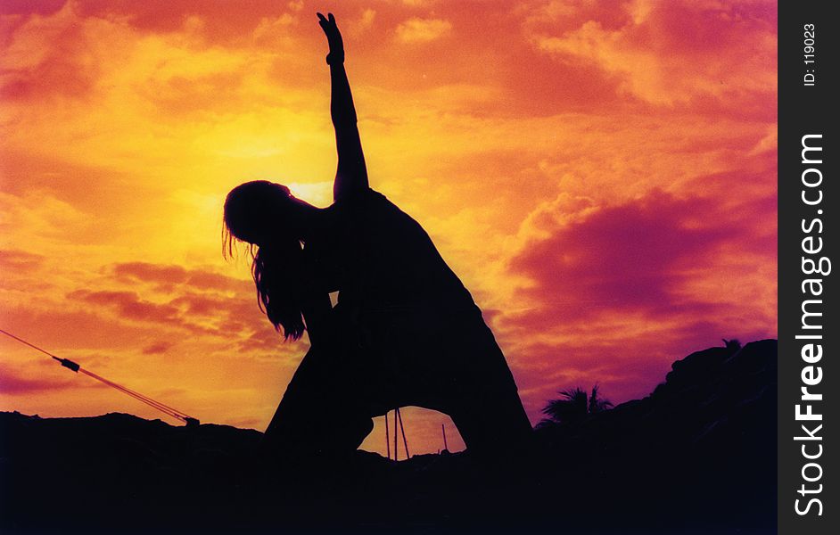 A woman posing at sunset in Key West, Florida