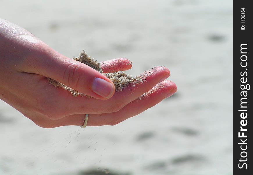 Sand In Hand