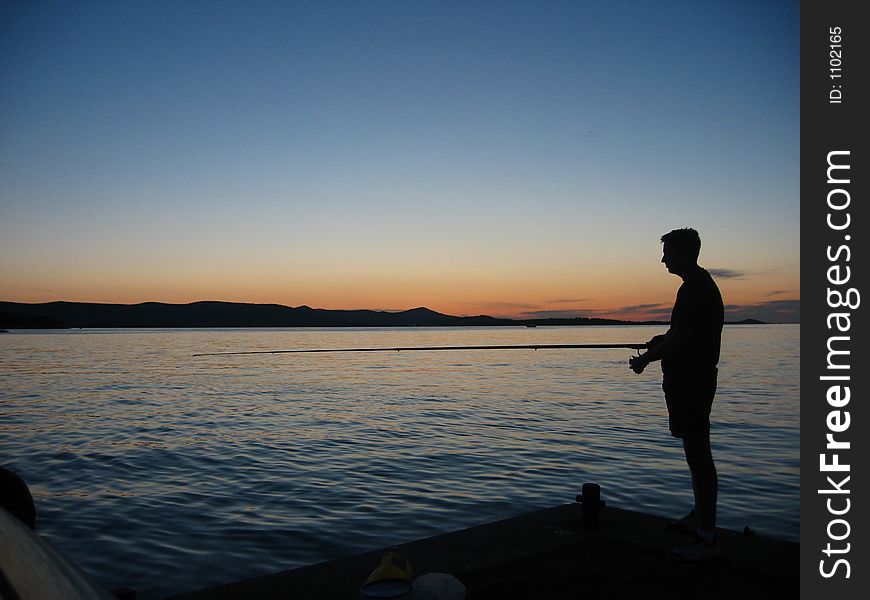 Fishing in the twilight. Fishing in the twilight