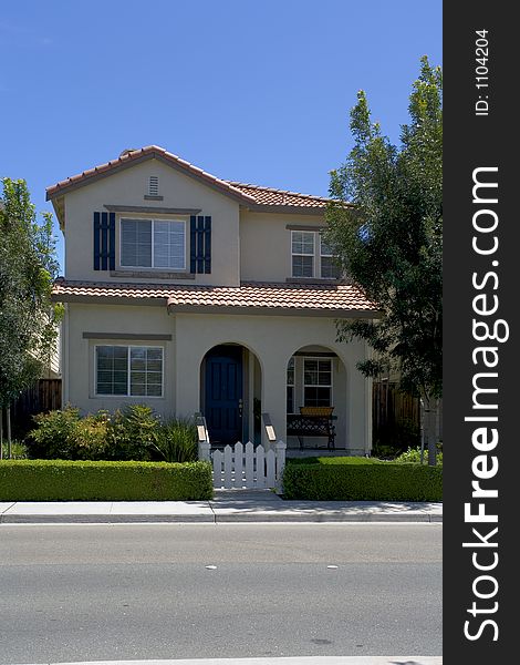 Exterior shot of a small, urban, custom Home. Exterior shot of a small, urban, custom Home.