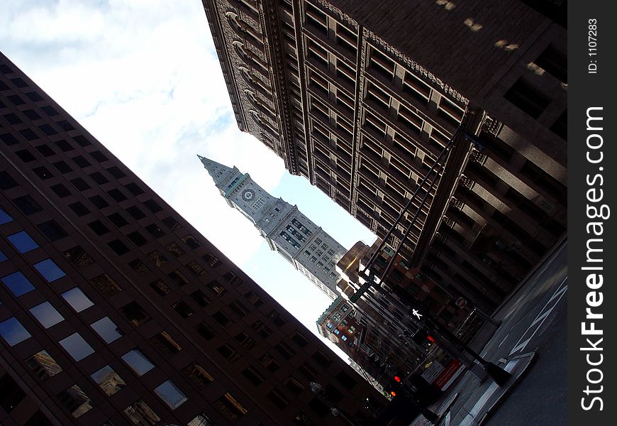 Angled view of street in boston, showing clock tower and walk signal at congress street intersection. Angled view of street in boston, showing clock tower and walk signal at congress street intersection