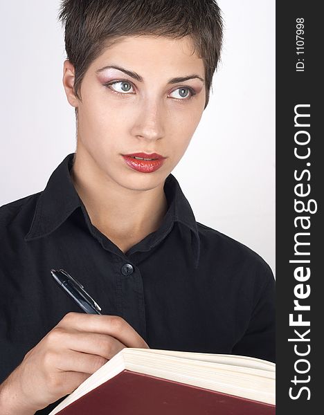 Attractive girl with handbook