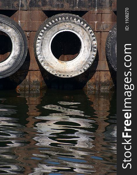 Tire in harbor  reflexions in denmark. Tire in harbor  reflexions in denmark