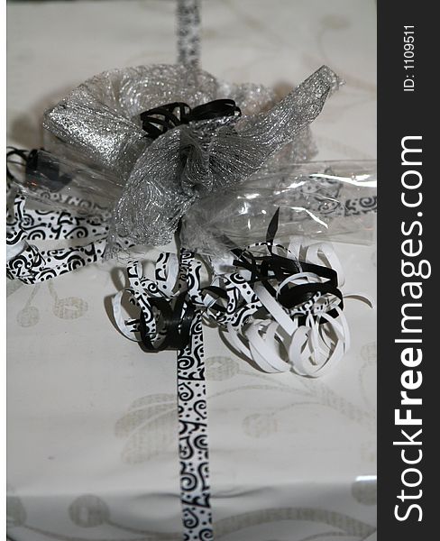 A black and white wrapped gift