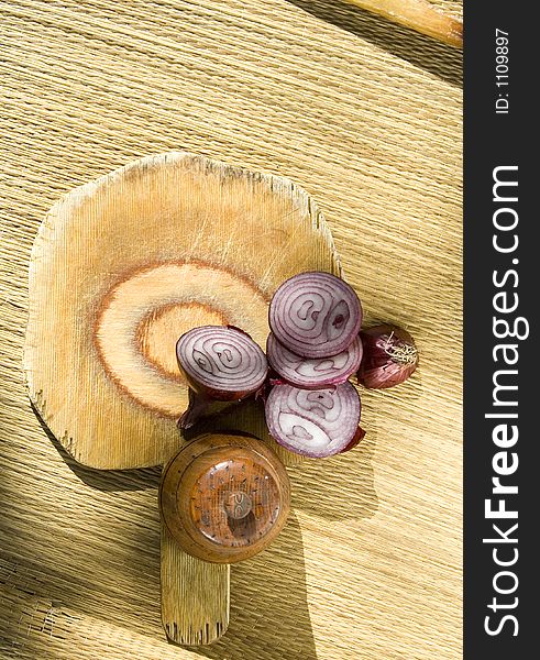 Image of red onion a piece cut with board. Image of red onion a piece cut with board