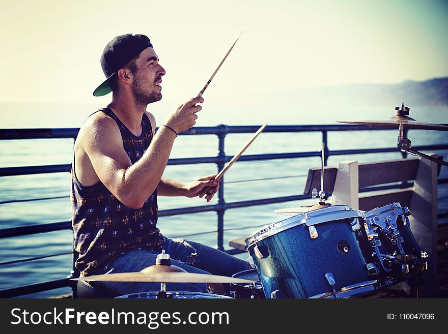 Man Playing Drums