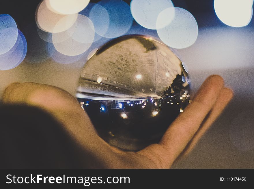 Crystal Ball on Person&#x27;s Hand