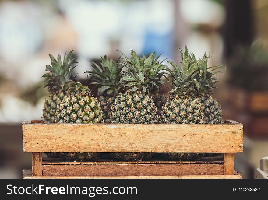 Pineapple Fruits on Wooden Crate